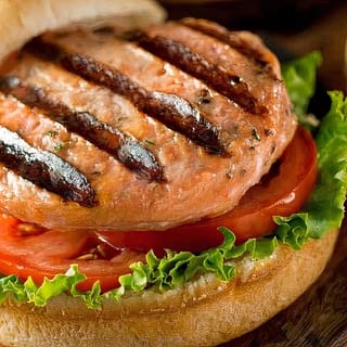 Salmon Burger served w/ fries.